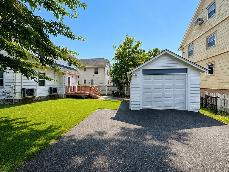 Detached 1 car garage plus additional parking in driveway