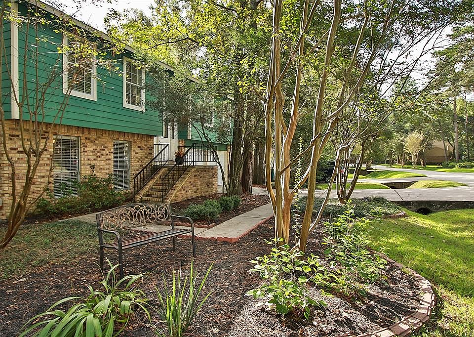 The landscaping provides a nice curb appeal as you approach the home.