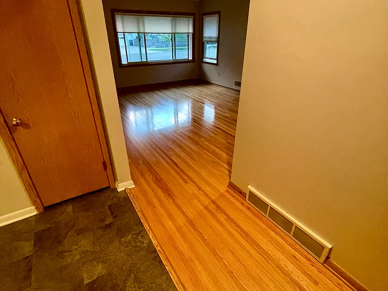 Living room with hall leading to bedrooms on main level