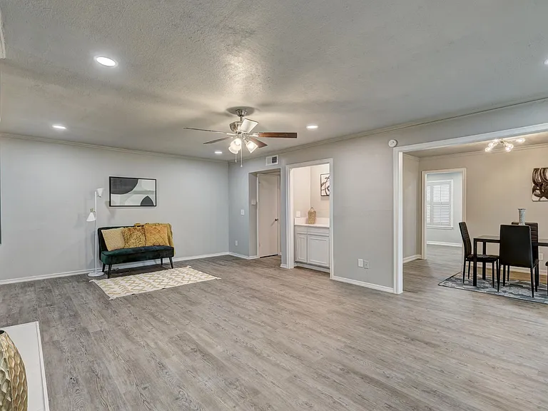 Huge living room with wet bar and patio access.