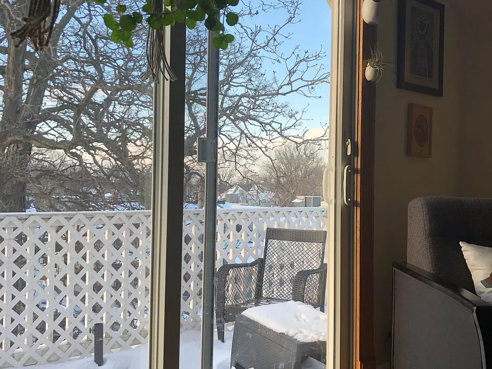 LR patio doors to 6 x 20 open patio that faces west and views all the way to the capital.