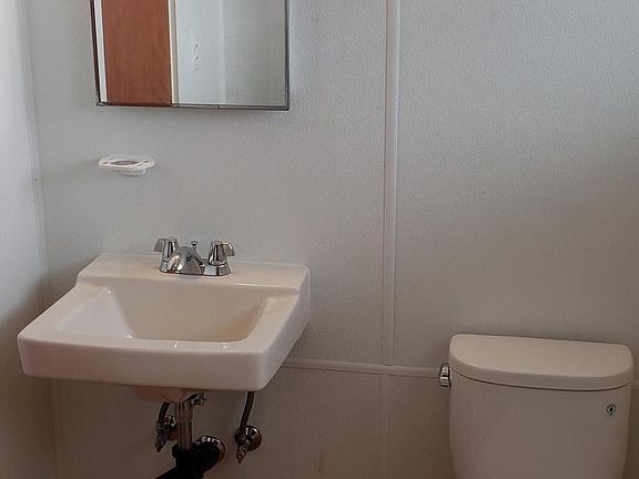 New bathroom sink, lighting and toilet