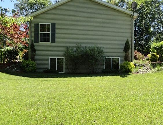 Great attention was paid to the placement of the home during original construction allowing for plenty of natural light, as well as a great view from the lower level which faces the pond!
