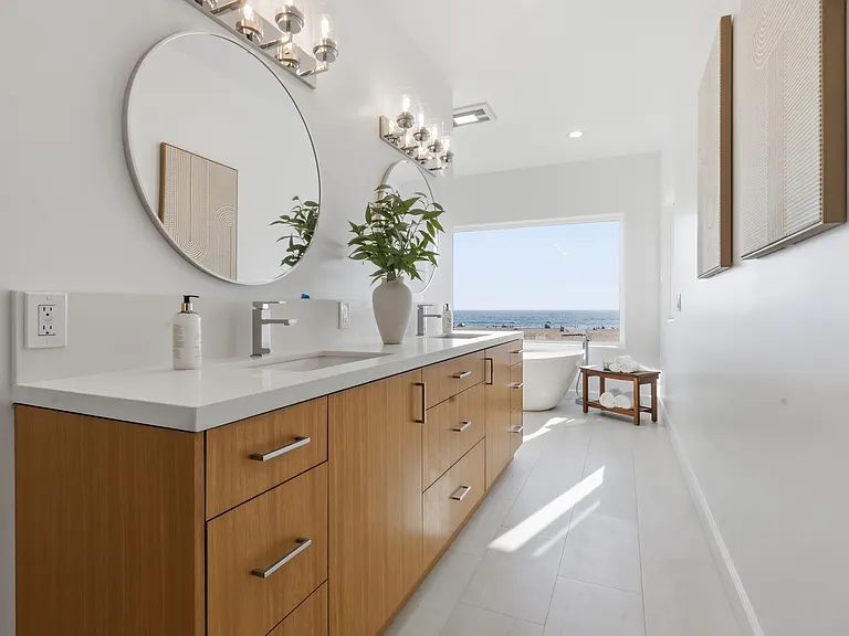 Primary bedroom features a covered balcony, fireplace, large spa bathroom, and incredibly spacious walk-in closet.
