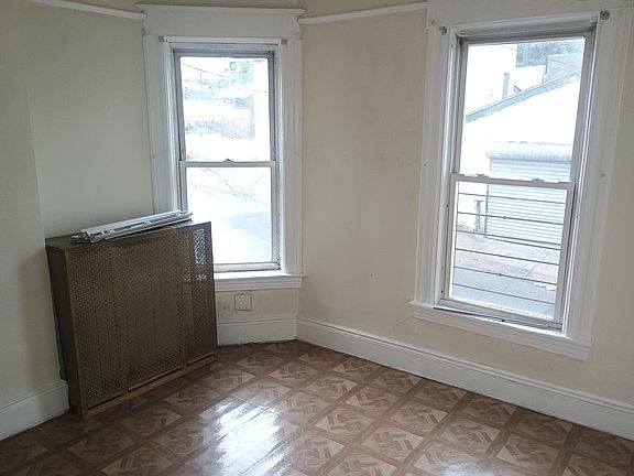 Bedroom 4 showing outer view from 2 windows