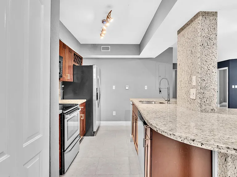 2881 N Oakland Forest Dr #105 — Photo 8