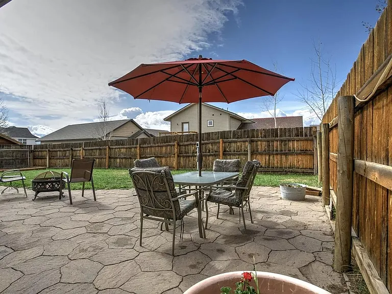 patio and fenced in yard