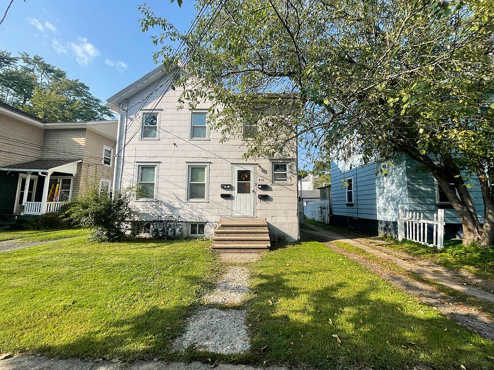 Front view - Lawn and snow maintenance included Driveway parking included