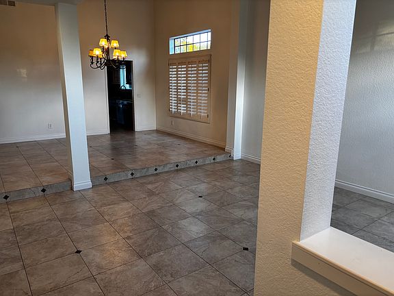 Formal living room and dining room viewed from front entrance