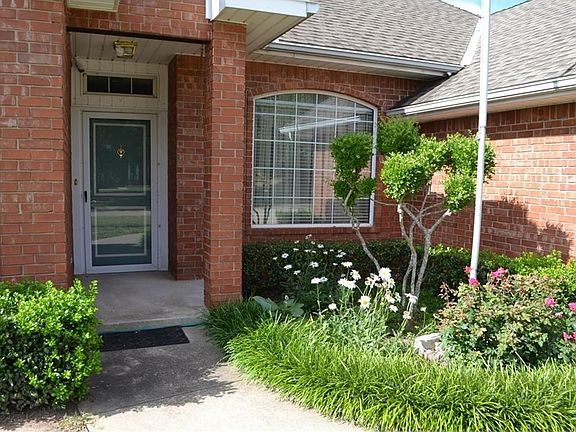 Entry with beautiful landscaping