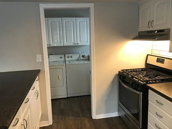 Separate laundry/mud room off side door.