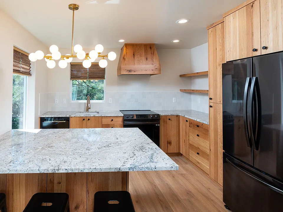 Custom oak cabinets, slab counter tops, tile backsplash