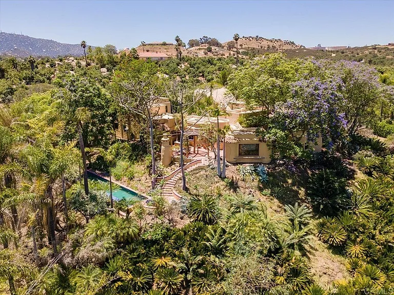 Birdseye view of the house with lap pool below.