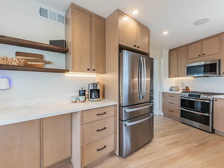 Fully furnished kitchen with ample storage and counter space