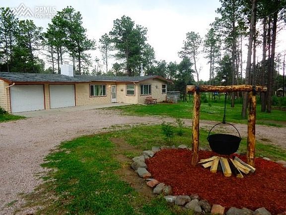 Almost 2 acres to enjoy, horse shoes and fresh garden veggies. [in season]