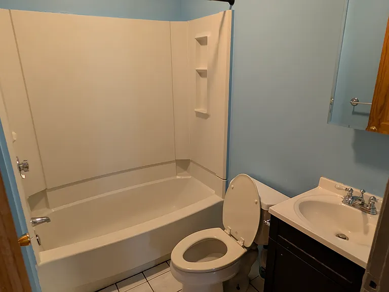bathroom off kitchen (1st fl)