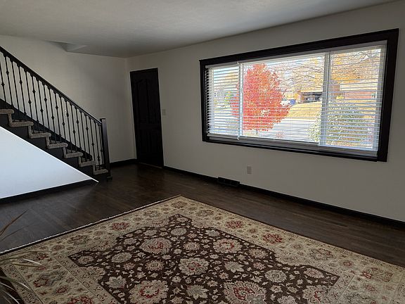 Family Room with abundant natural light and views of the beautifully xeriscaped front yard.