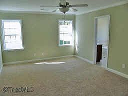 MASTER BEDROOM PROVIDES BATH WITH JETTED TUB AND SEPARATE SHOWER