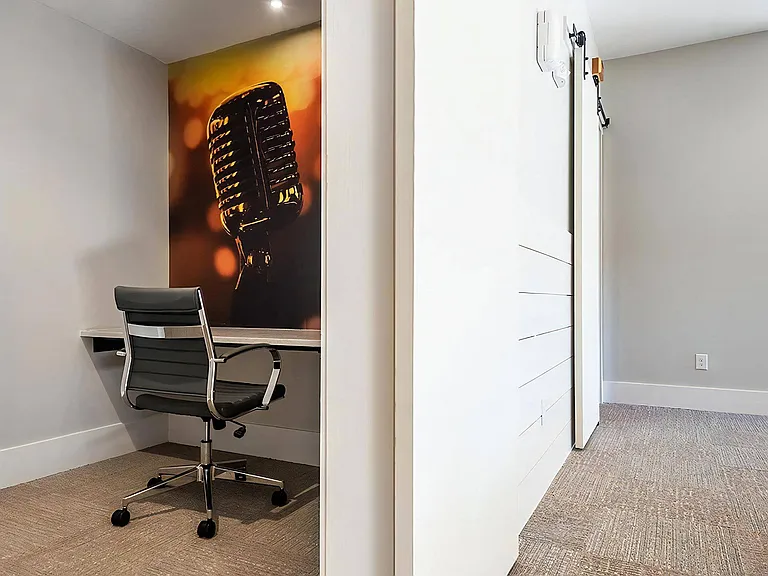 Small Workspace with Chair and Microphone-Themed Wall Art