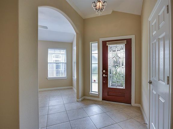 as you enter the study is immediately to the right with plenty of natural light and large coat closet to the left. Just past the coat closet is an entry to the kitchen or thru the hallway to the family room. Large easy maintenance tile thru the area.