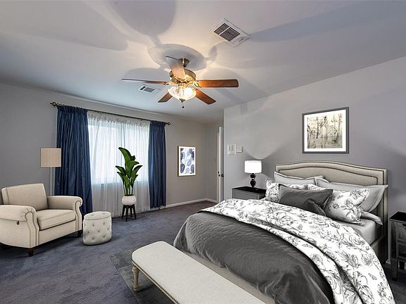Master bedroom to rear of home. Virtually staged.