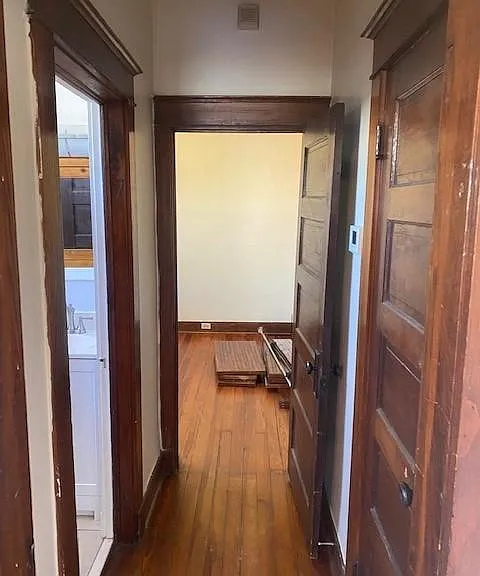 Hallway, to the left =Bathroom, To the right is the Pantry.