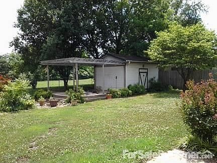 Private Backyard w/arbor & water garden