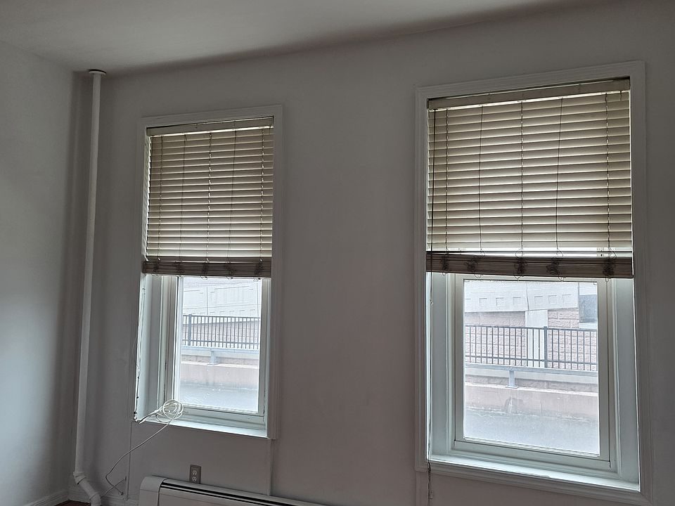 Front room. Living room with two large windows and great light.