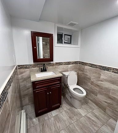 3rd image of 125 Bay 53 St #Basement