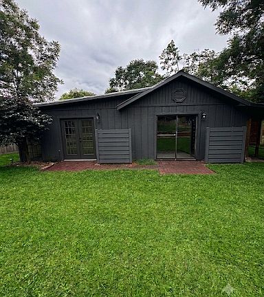 Rear view of house, newly painted