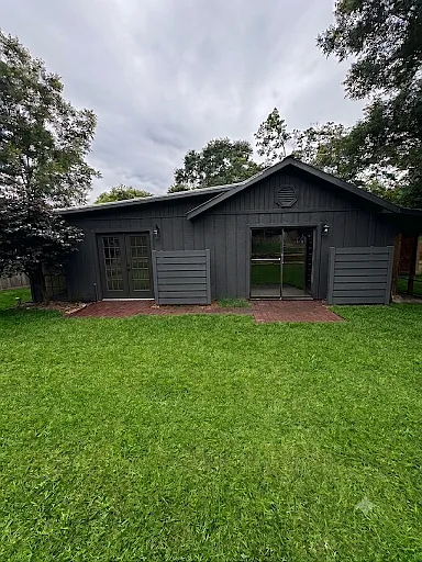 Rear view of house, newly painted