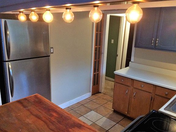 Kitchen View to Fridge GlsRange & Pantry