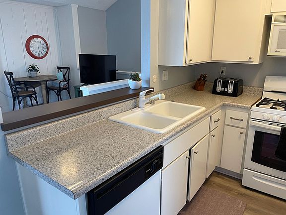 Kitchen opens to living space