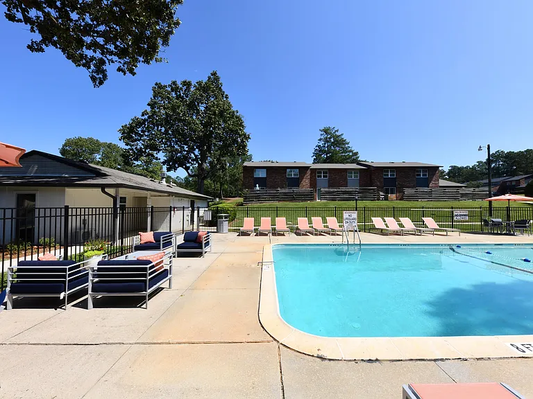 Pool area with lounge chairs