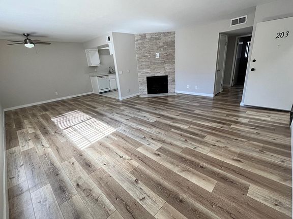 Spacious open concept living & dining space, with gas fireplace