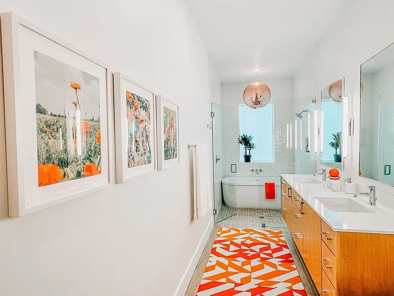 Modern bathroom featuring a freestanding tub and a glass-enclosed shower