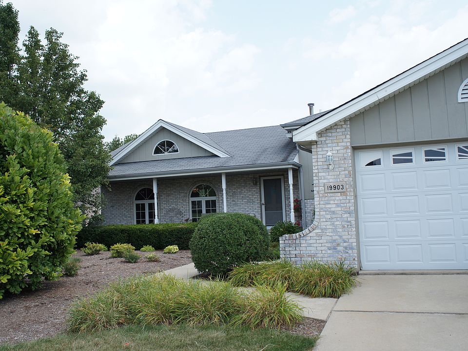 Brick and Cedar Tri level
