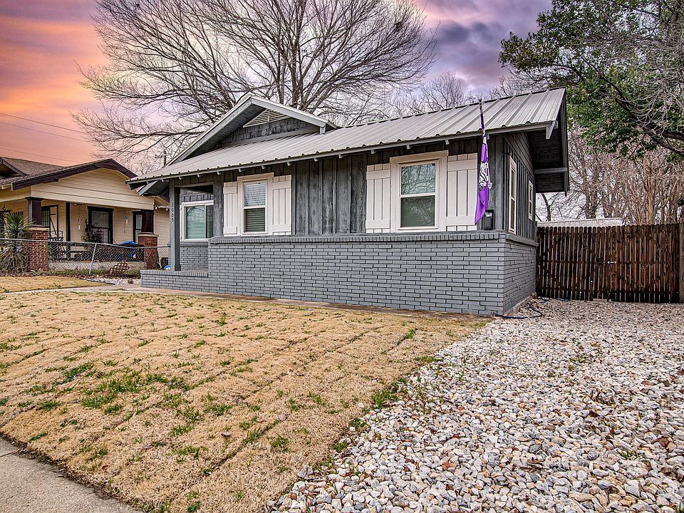 Access to house is through gravel drive and gate.