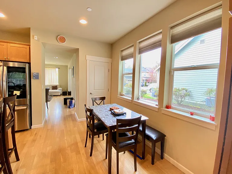 Kitchen nook area with pantry and cabinets to store your favorite breakfast & food items! This is our favorite spot :)