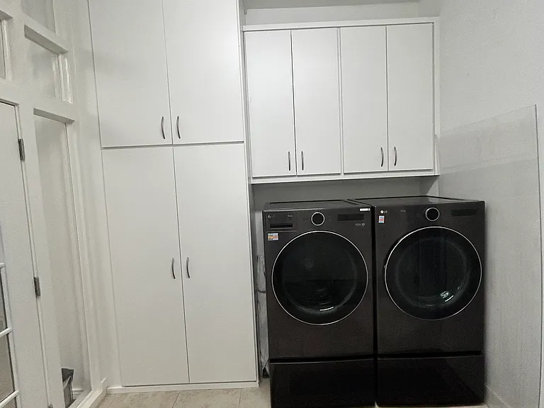 Laundry with plenty of Storage Cabinets (Storage #4)