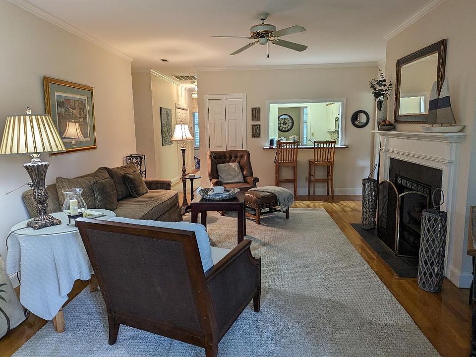 Comfortable living area with wet bar and eat-at bar