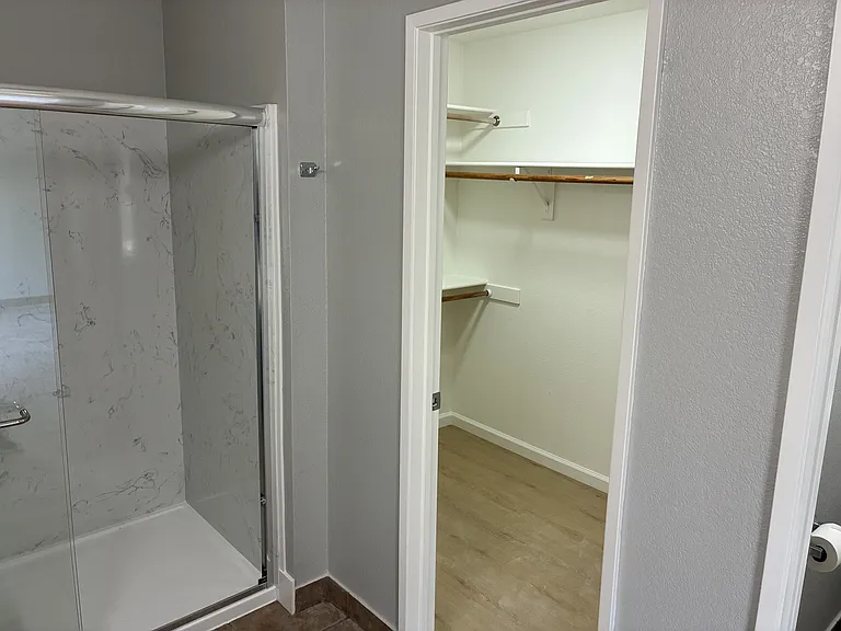 Walk-in closet with brand new LVP flooring