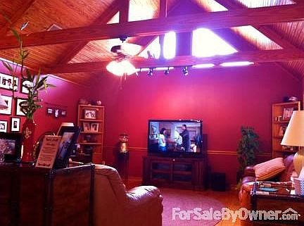 FAMILY/GREAT ROOM
						:
						Warm and cozy with cathedral ceiling and wood floors.