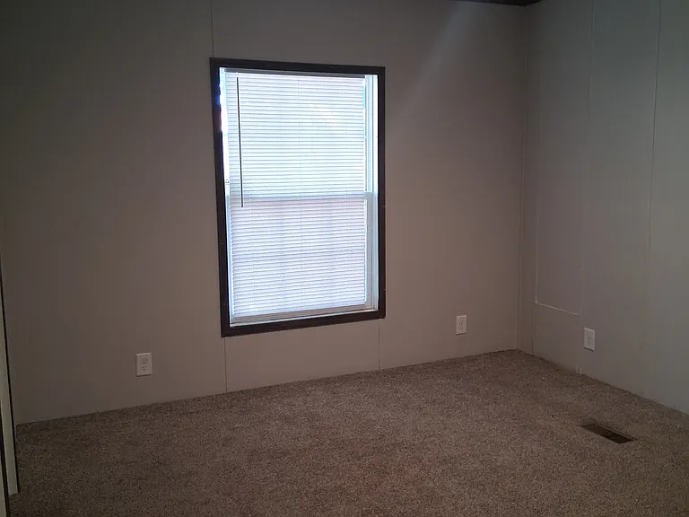 Carpeted bedrooms throughout - in the Primary bedroom the large size also comes with a large closet and double sink bathroom.