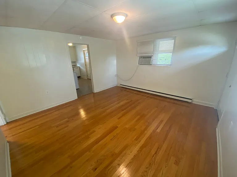 Private carport, in-unit laundry, and the Lakewood strip right outside your door. — Photo 5