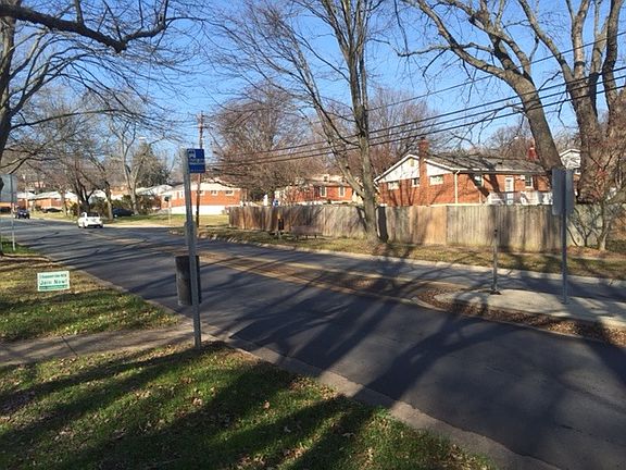 Bus stop at the end of the street.
