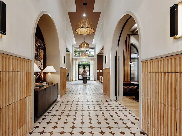 Designer apartment clubhouse with striking architectural details, artisan finishes, and elevated community spaces.