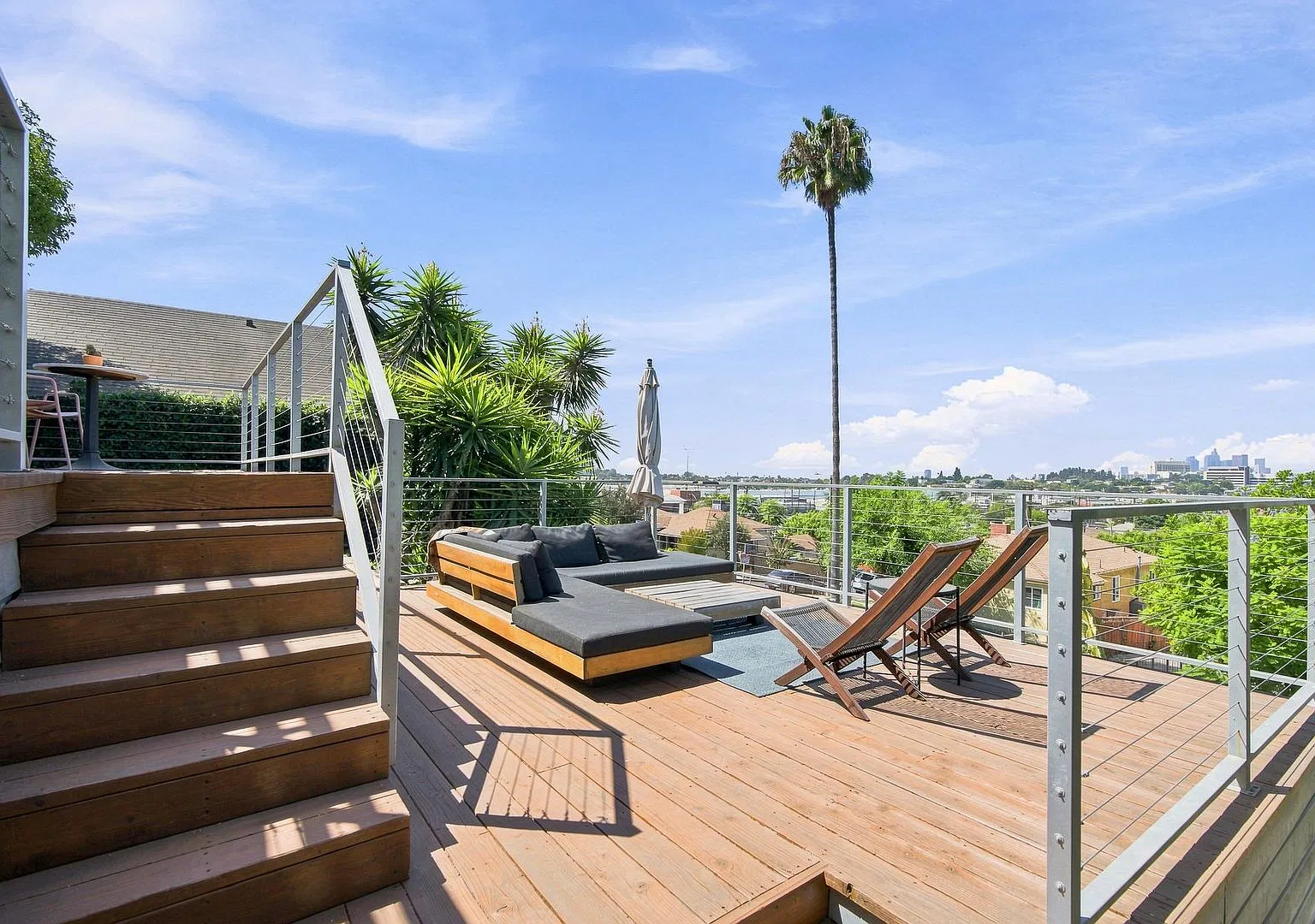 Charming Hillside Retreat with Modern Upgrades, Stunning City Views & Expansive Outdoor Living! — Photo 2