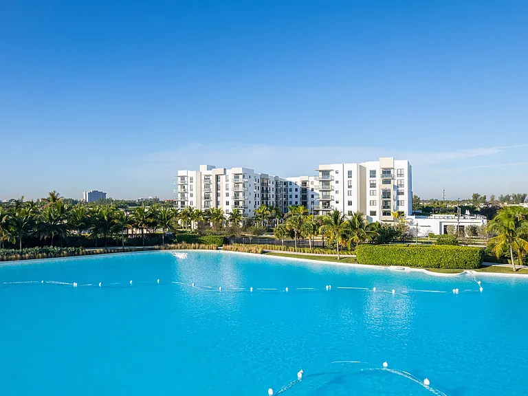 Overlooking SoLe Mia's iconic seven-acre Crystal Lagoon, Villa Laguna offers a waterfront lifestyle unlike anywhere else in South Florida.