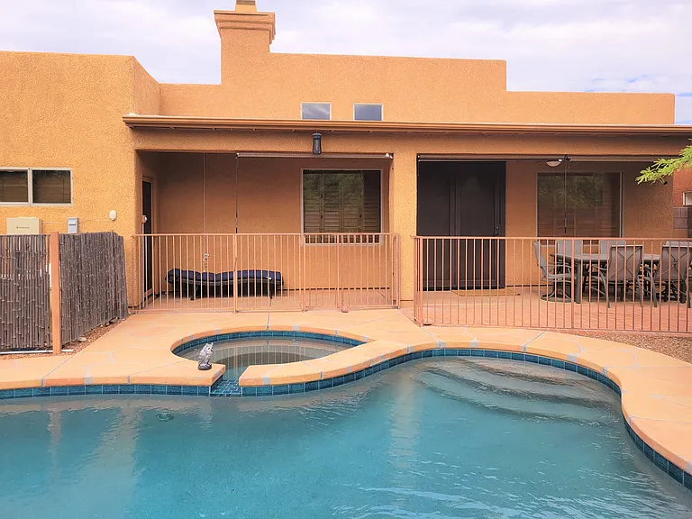 Back yard has seating area
